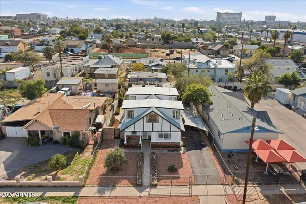 an aerial view of a house with a mountain view