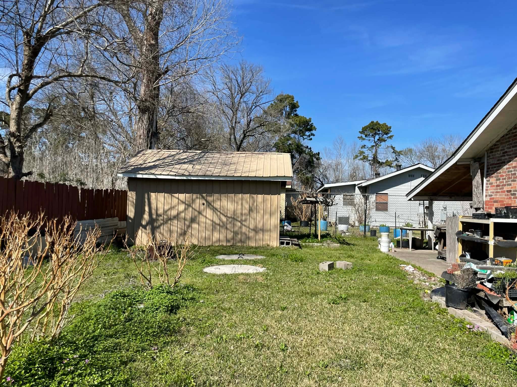 1825 Isom Street Houston, TX 77039 - Photo 9 of 27 a view of a house with a yard