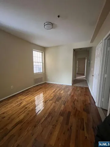 a view of an empty room and window