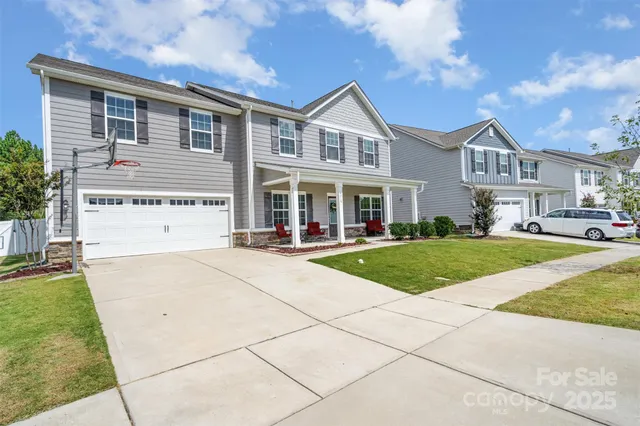 a outdoor living space with patio furniture and a potted plant