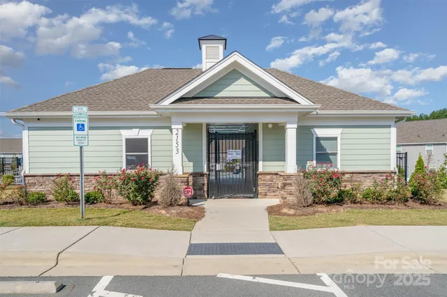 a view of a swimming pool with a lounge chair