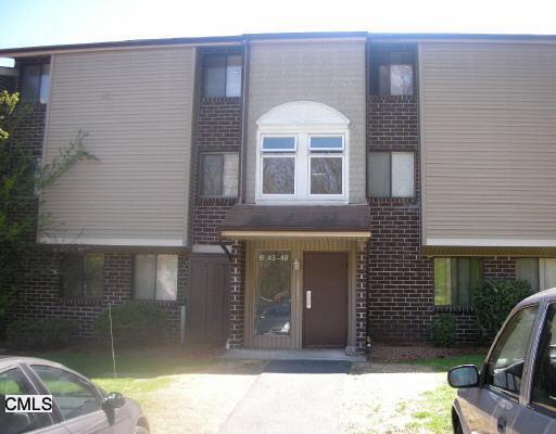 7 Padanaram Road, Unit 146 Danbury, CT 06811 - Photo 1 of 1 a front view of a house with a glass door