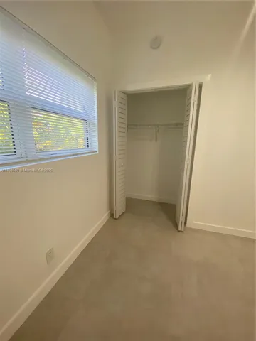 a view of a porch with a yard