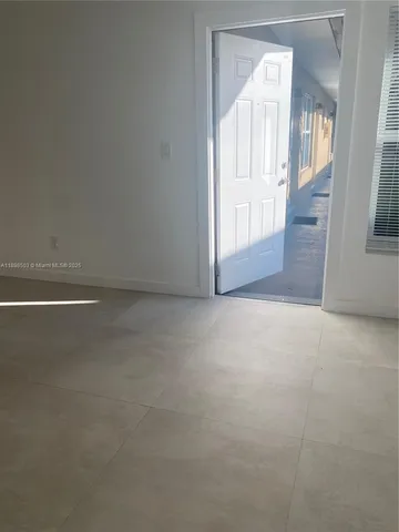 an empty room with a workbench