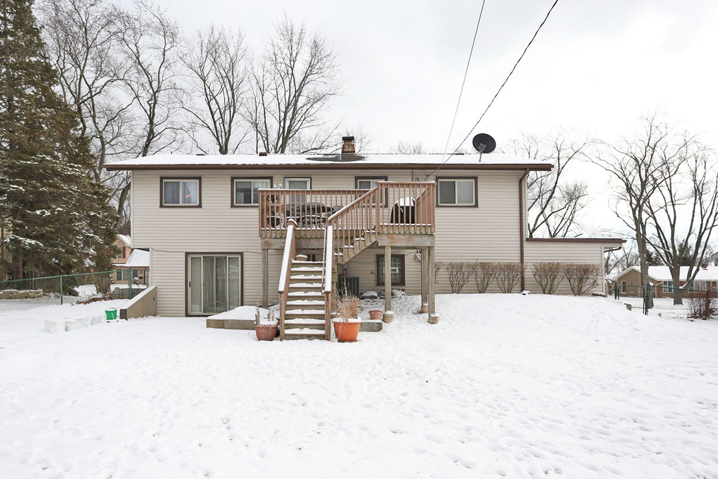 640 Edgemont Lane Hoffman Estates, IL 60169 - Photo 28 of 30 a view of a house with snow on the road