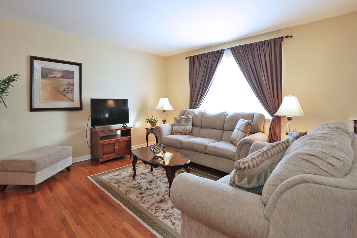640 Edgemont Lane Hoffman Estates, IL 60169 - Photo 3 of 30 a living room with furniture and a flat screen tv