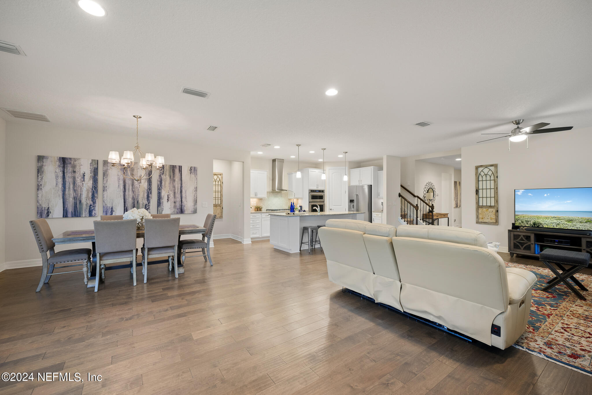 91 Broomsedge Circle St. Augustine, FL 32095 - Photo 15 of 45 a living room with furniture a dining table and chairs