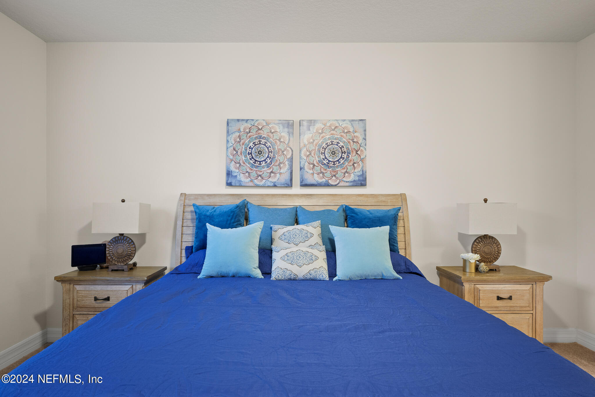 91 Broomsedge Circle St. Augustine, FL 32095 - Photo 16 of 45 a bedroom with a bed and a couch