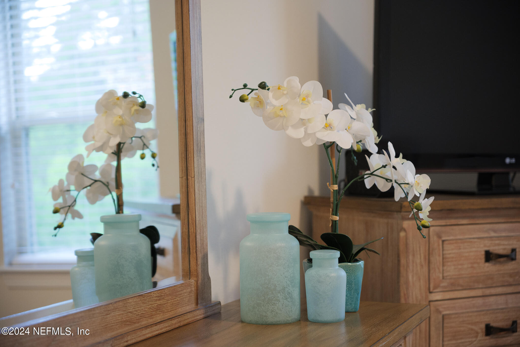 91 Broomsedge Circle St. Augustine, FL 32095 - Photo 18 of 45 a room with a potted plant