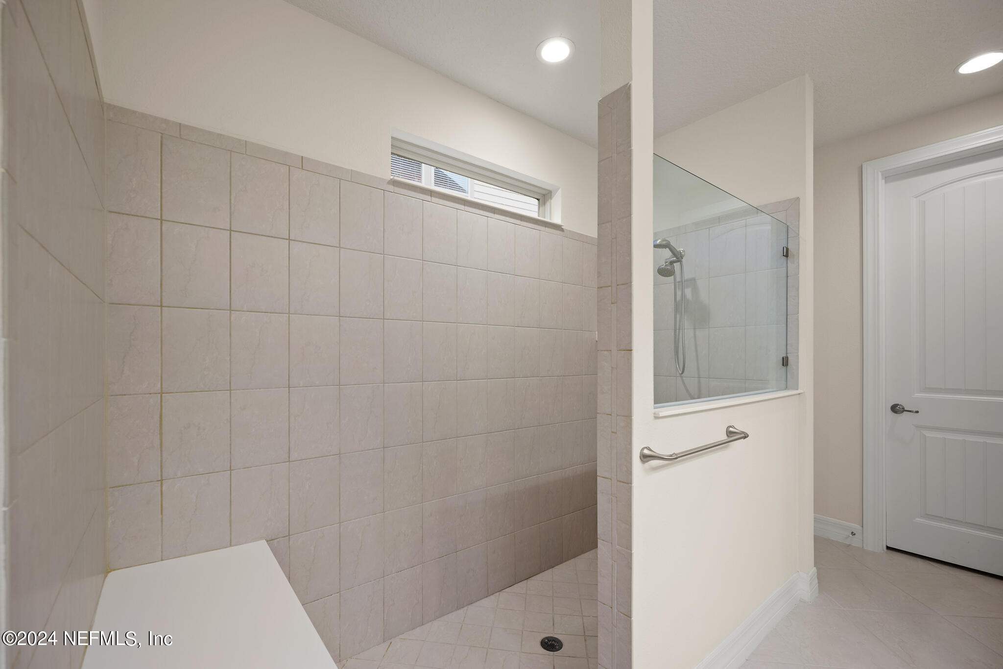 91 Broomsedge Circle St. Augustine, FL 32095 - Photo 20 of 45 a bathroom with a shower and toilet