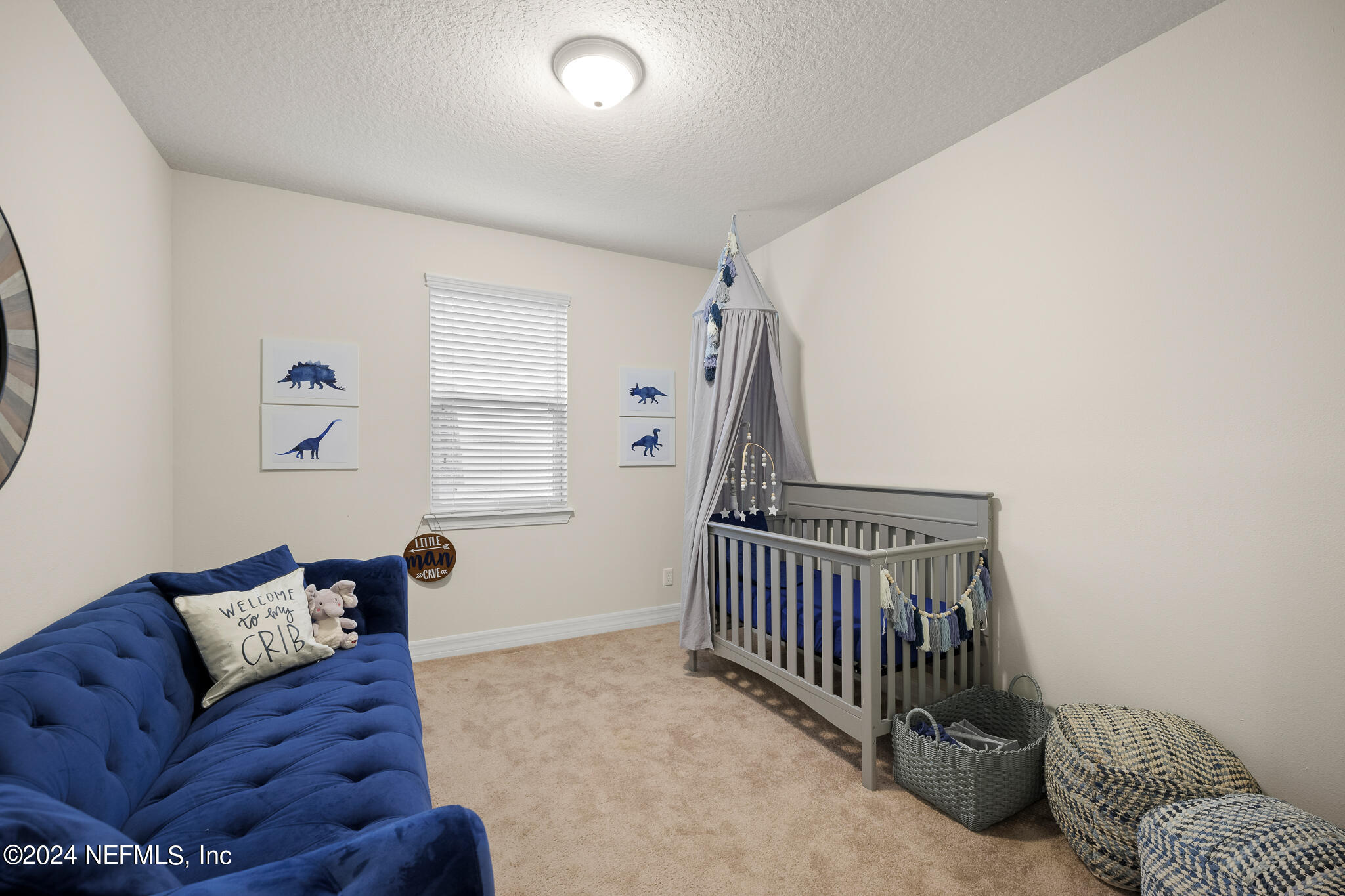 91 Broomsedge Circle St. Augustine, FL 32095 - Photo 26 of 45 a living room with furniture and a window