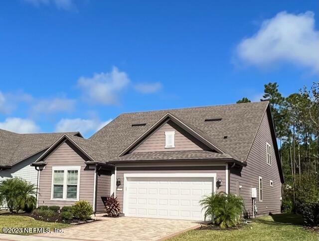 91 Broomsedge Circle St. Augustine, FL 32095 - Photo 3 of 45 front view of a house with a yard