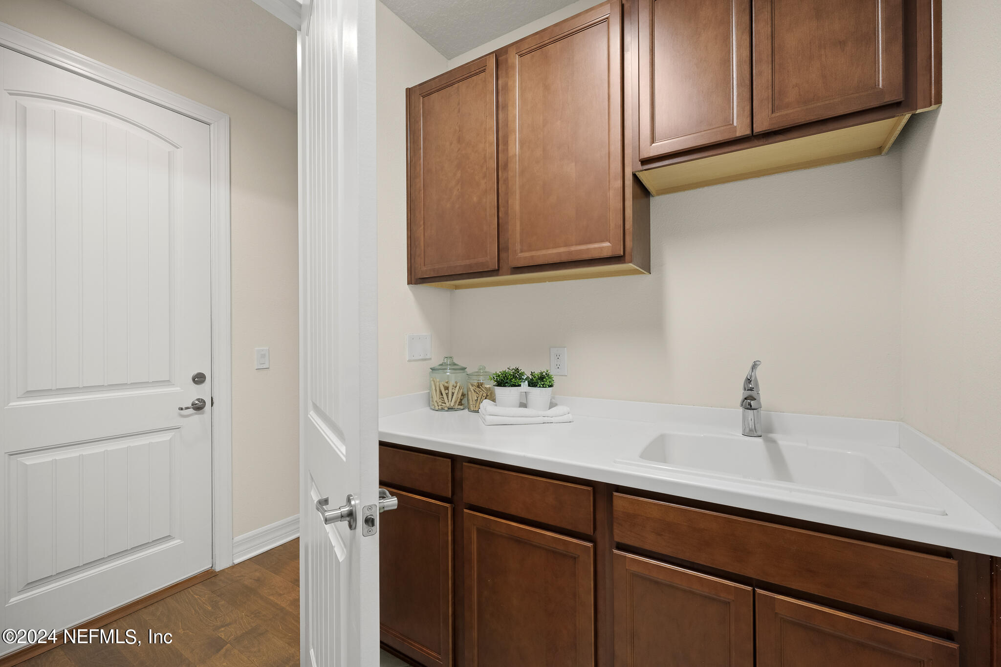 91 Broomsedge Circle St. Augustine, FL 32095 - Photo 33 of 45 a sink with a mirror