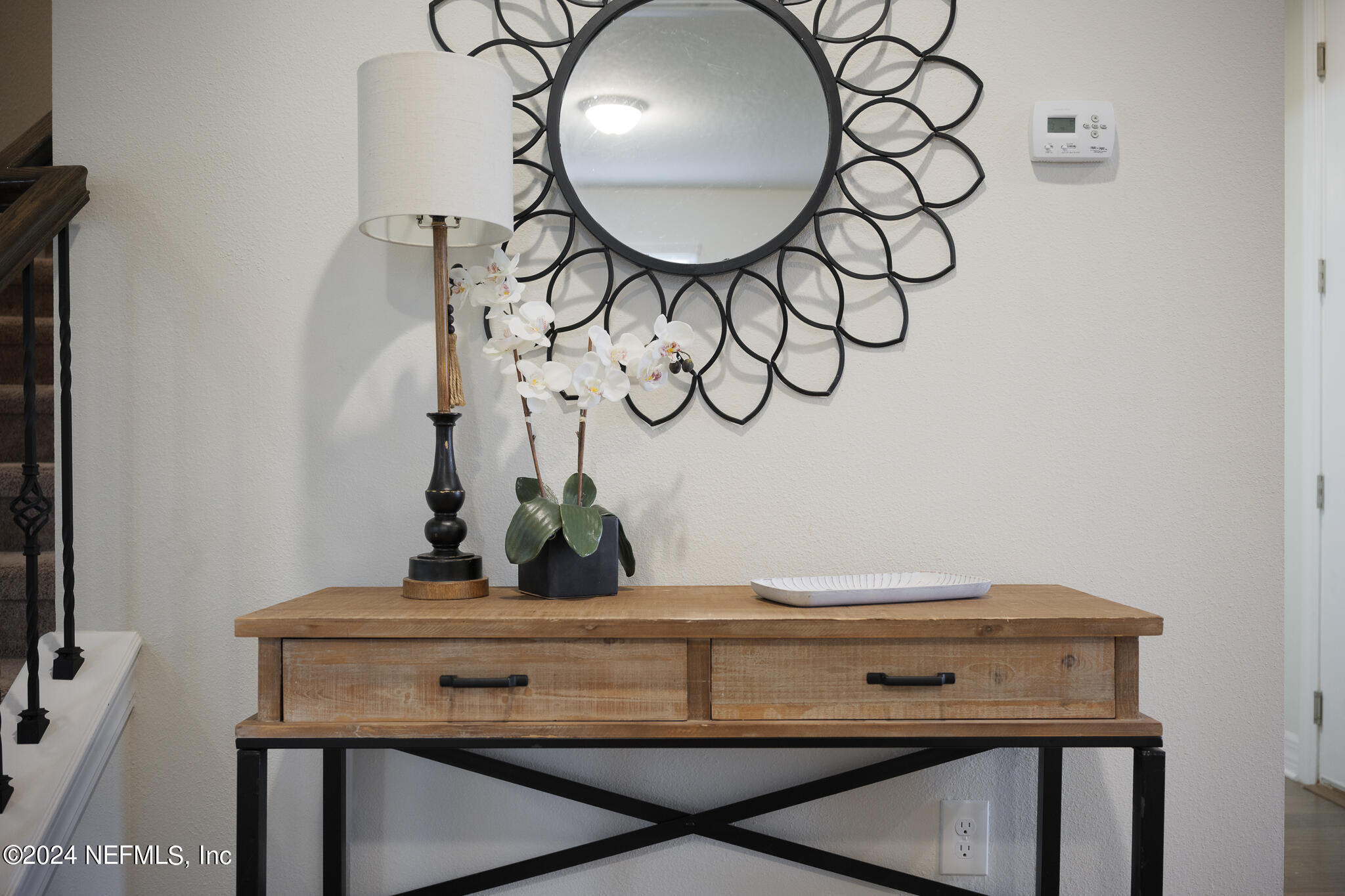 91 Broomsedge Circle St. Augustine, FL 32095 - Photo 6 of 45 a view of room with a table and a mirror