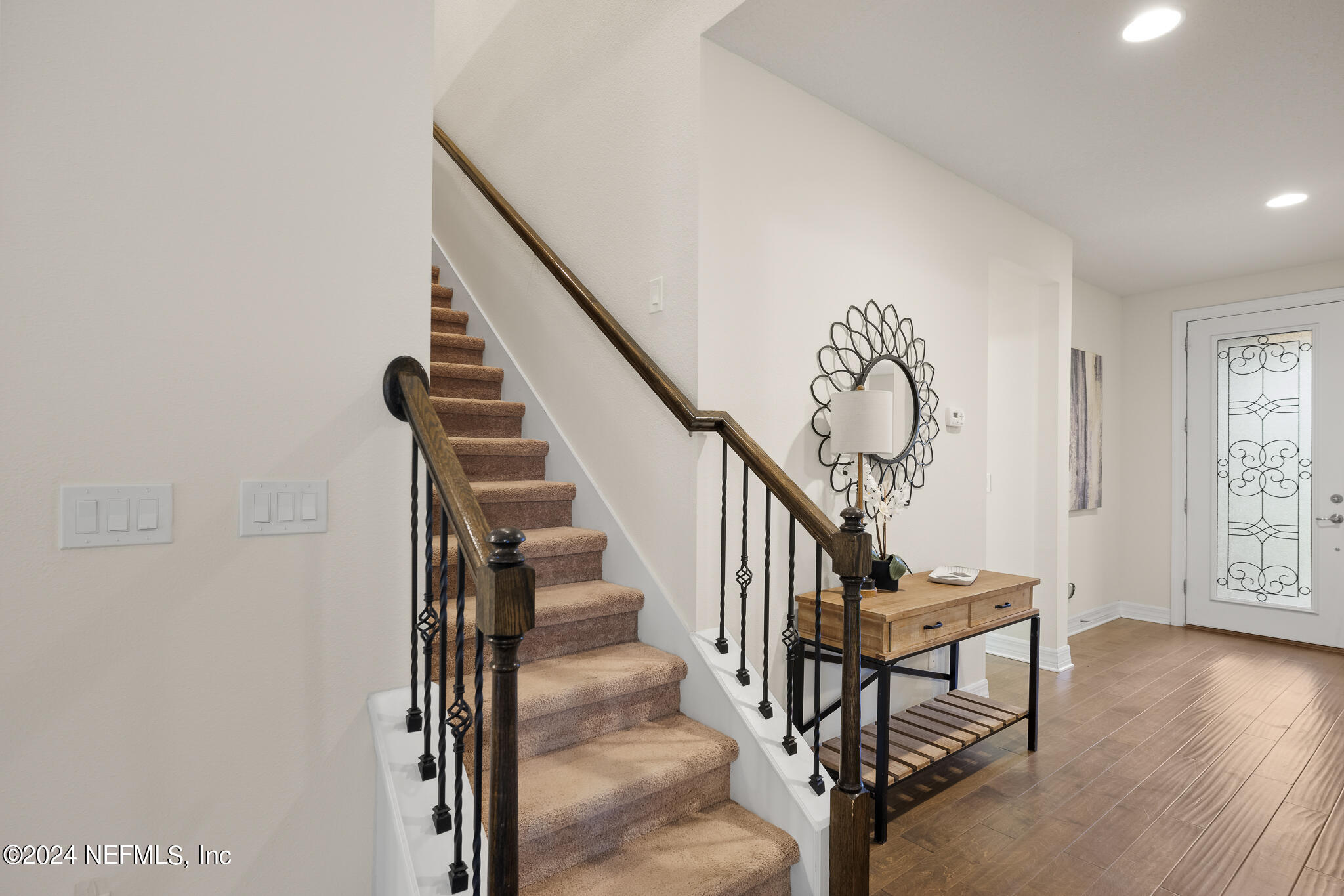 91 Broomsedge Circle St. Augustine, FL 32095 - Photo 7 of 45 a view of entryway and hall with wooden floor