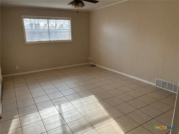 an empty room with windows