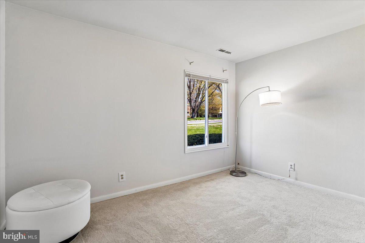 14515 Fiske Drive, Unit 160A Silver Spring, MD 20906 - Photo 13 of 20 an empty room with a toilet and a window