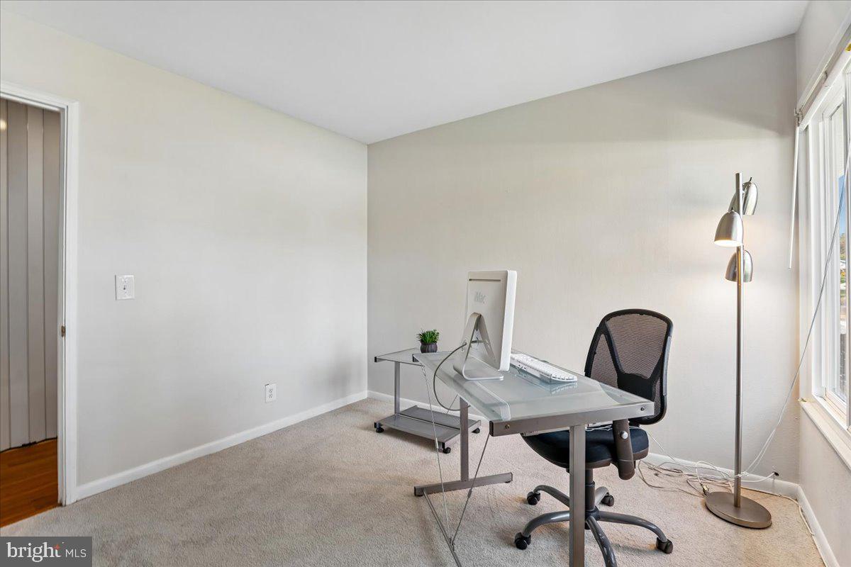 14515 Fiske Drive, Unit 160A Silver Spring, MD 20906 - Photo 17 of 20 a view of a workspace with furniture