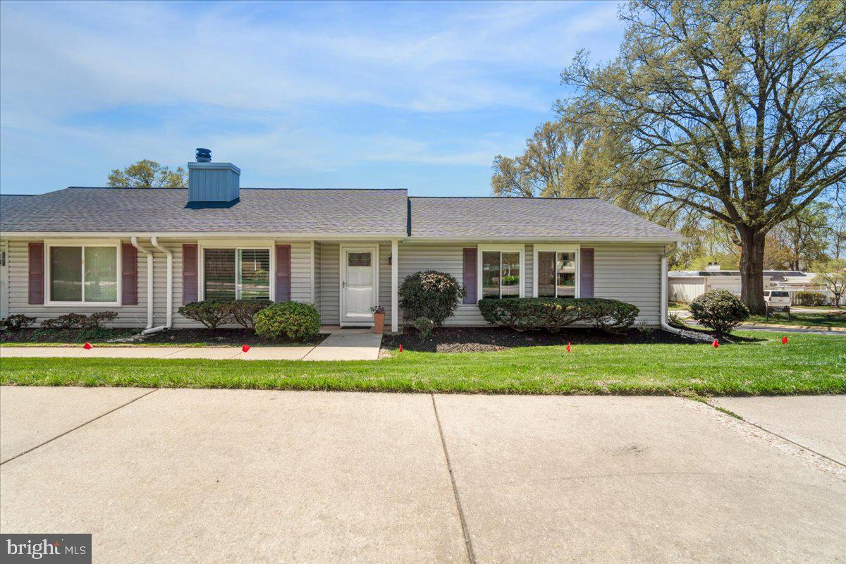 14515 Fiske Drive, Unit 160A Silver Spring, MD 20906 - Photo 19 of 20 front view of a house and a yard