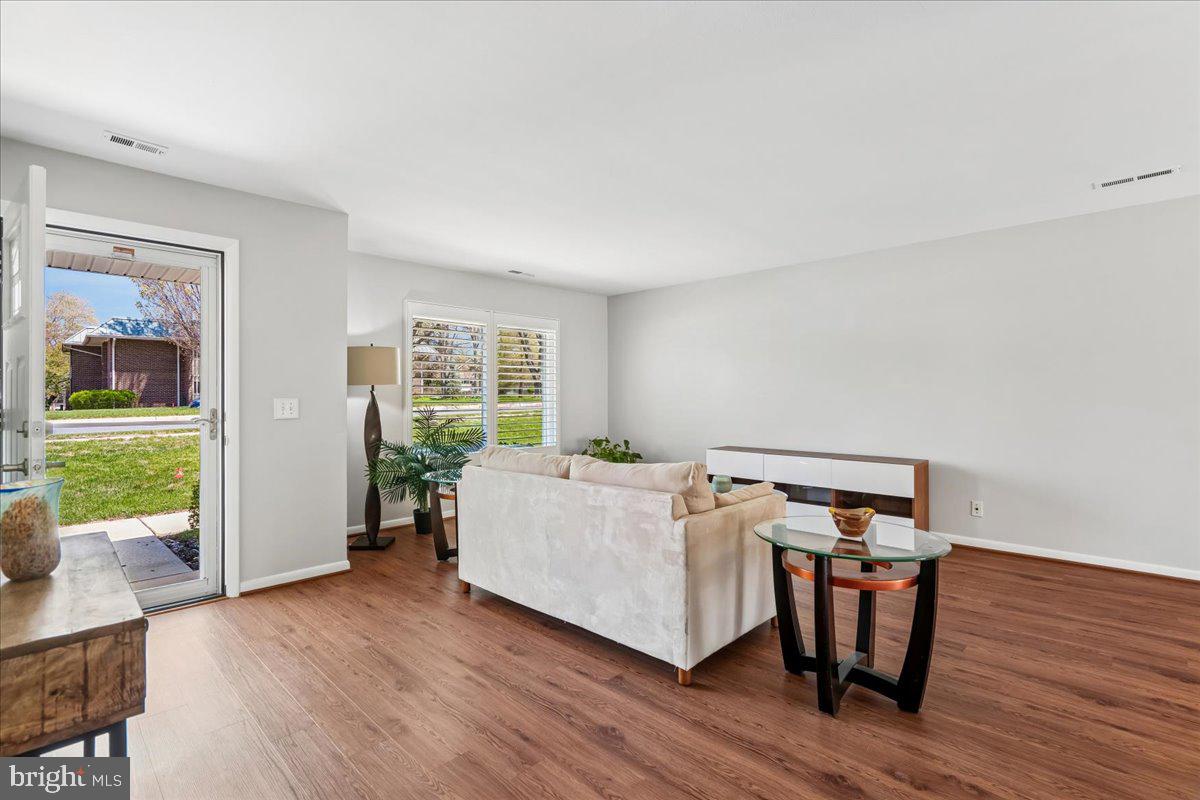 14515 Fiske Drive, Unit 160A Silver Spring, MD 20906 - Photo 3 of 20 a living room with furniture and a window