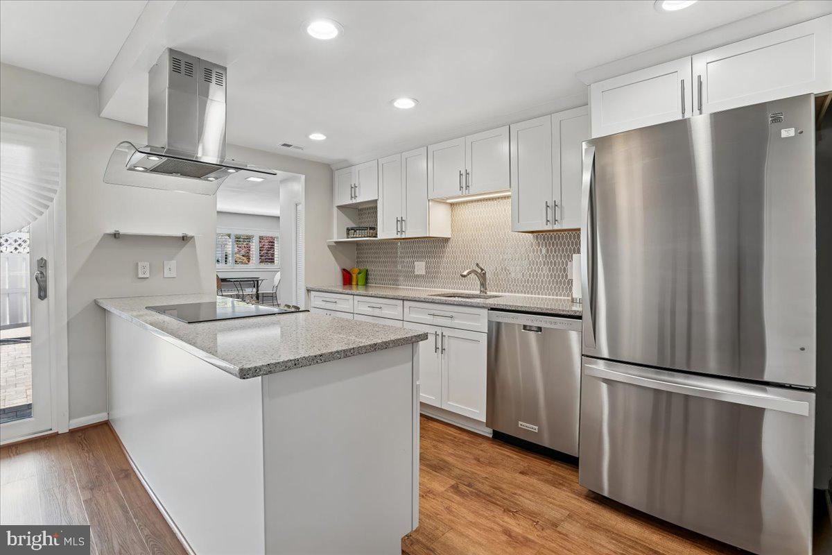 14515 Fiske Drive, Unit 160A Silver Spring, MD 20906 - Photo 4 of 20 a kitchen with stainless steel appliances a refrigerator sink and microwave