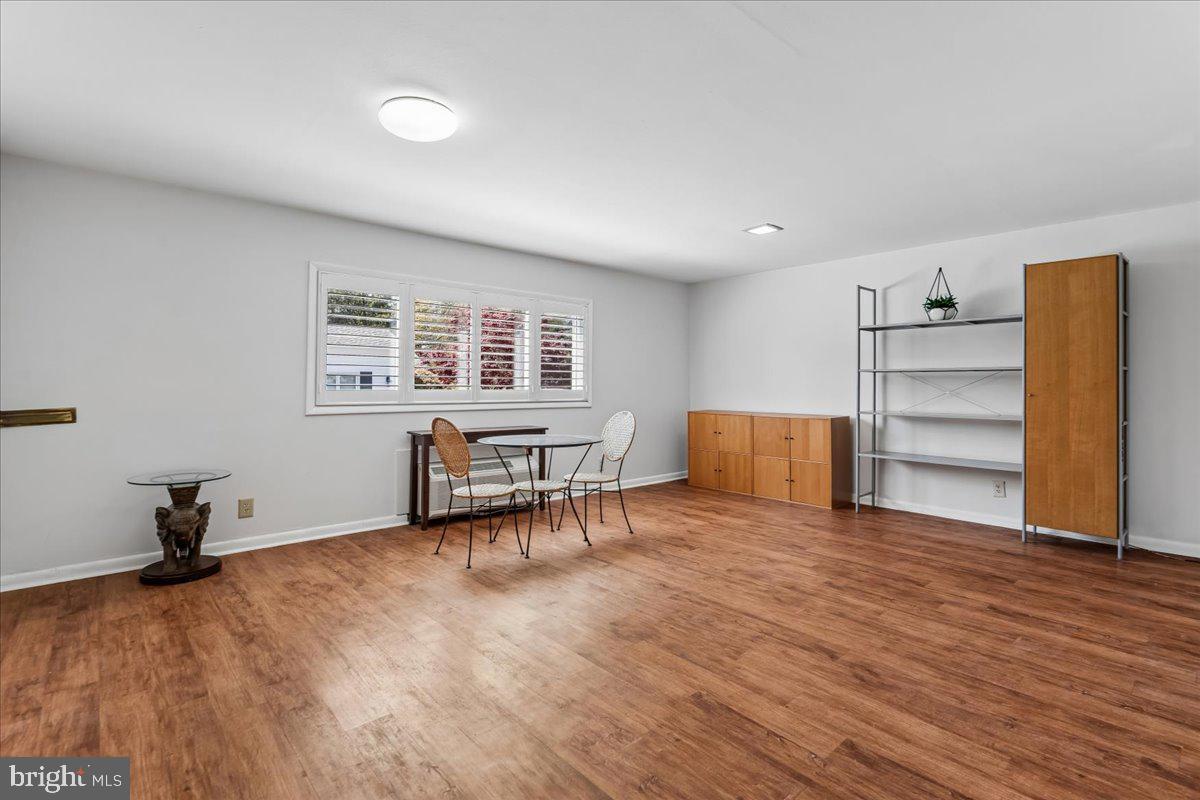 14515 Fiske Drive, Unit 160A Silver Spring, MD 20906 - Photo 7 of 20 a view of a livingroom with furniture and a window