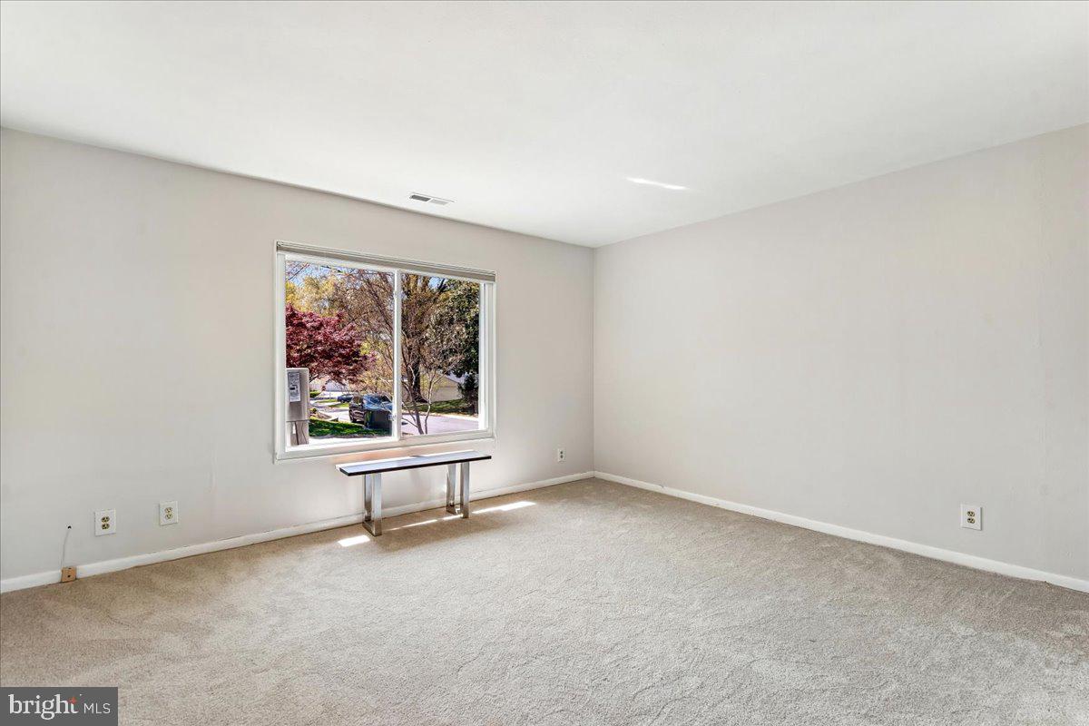 14515 Fiske Drive, Unit 160A Silver Spring, MD 20906 - Photo 10 of 20 an empty room with a window