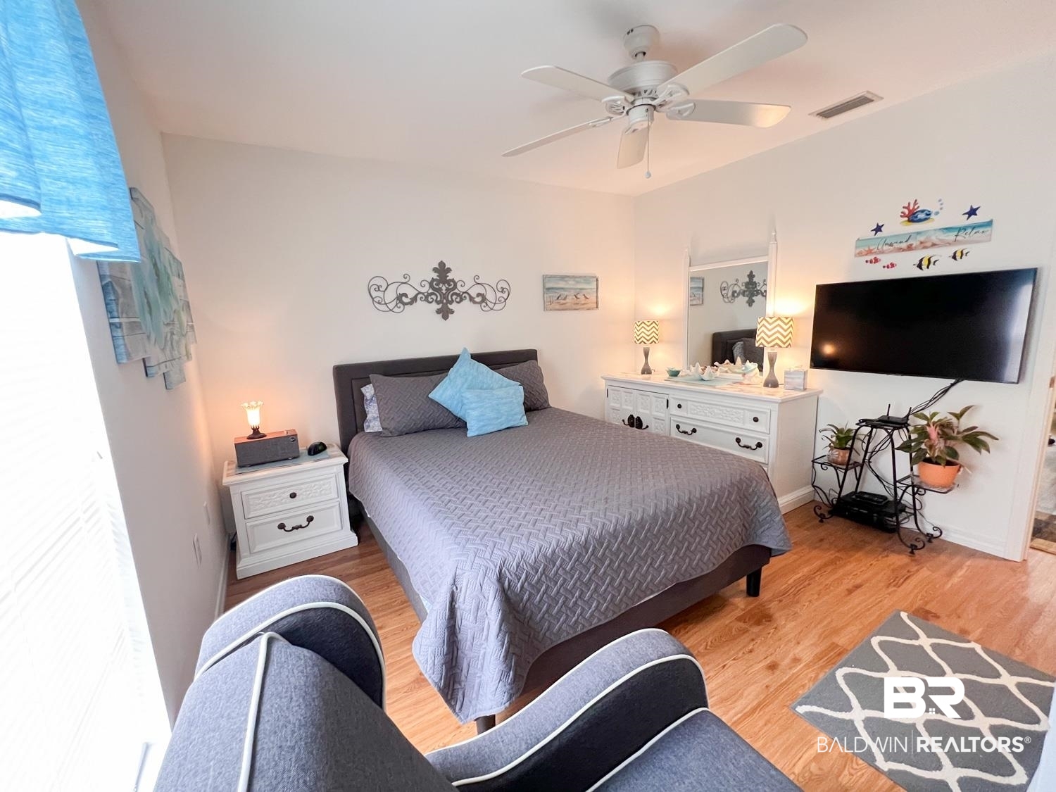16690 Plum Court Loxley, AL 36551 - Photo 14 of 30 Bedroom with hardwood / wood-style flooring and ceiling fan