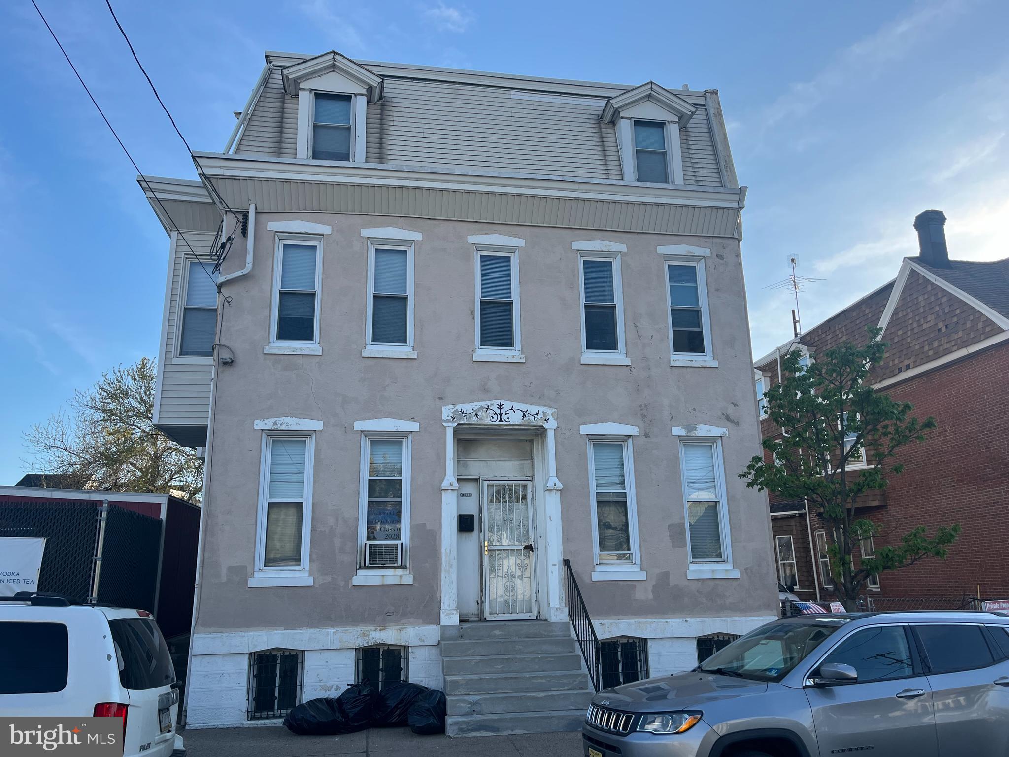 2666-00 Bridge Street Philadelphia, PA 19137 - Photo 13 of 13 a front view of a house with car parked