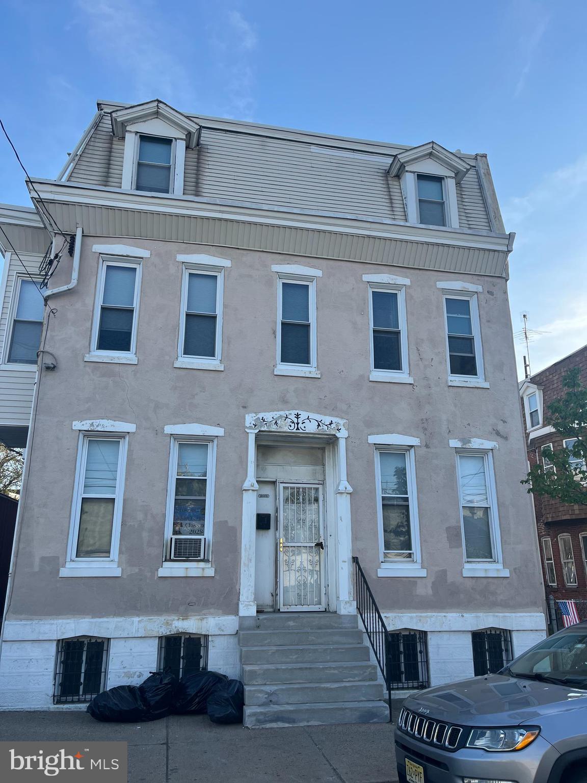 2666-00 Bridge Street Philadelphia, PA 19137 - Photo 2 of 13 a front view of a house with yard