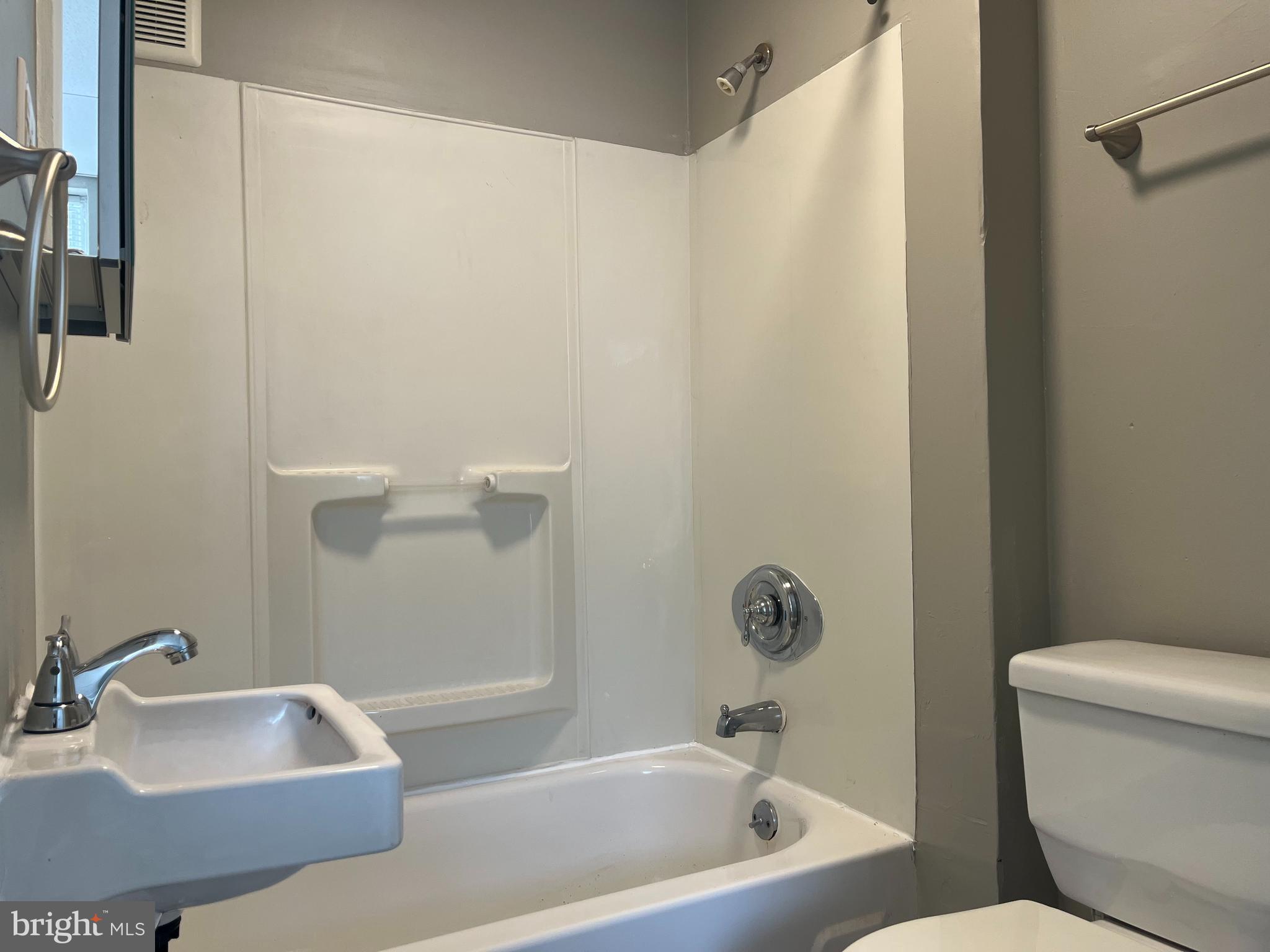 2666-00 Bridge Street Philadelphia, PA 19137 - Photo 5 of 13 a bathroom with a sink and a tub