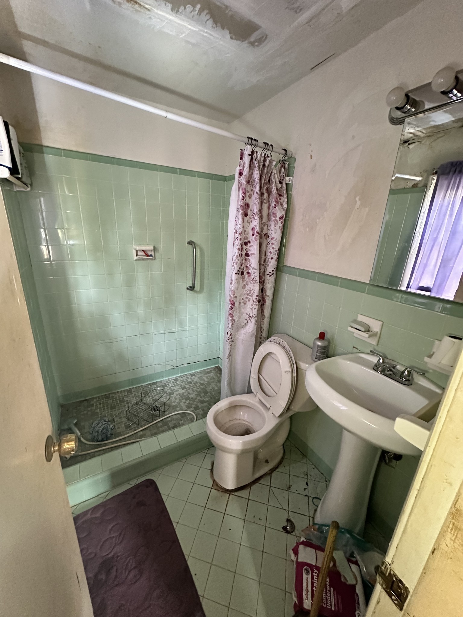 112 West Hackberry Street Centerville, TN 37033 - Photo 9 of 15 a bathroom with a sink and a mirror