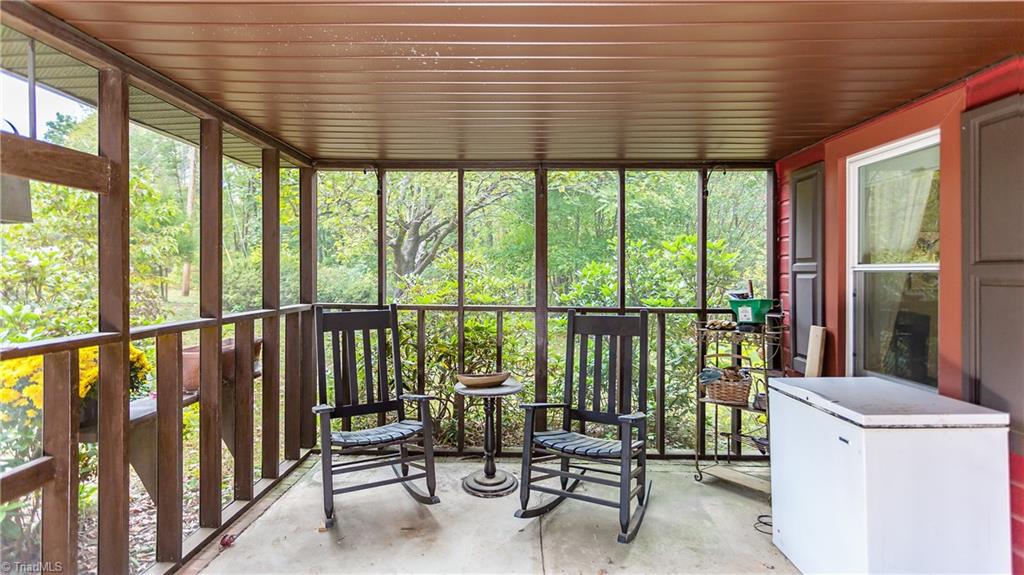 932 Smith Road Stoneville, NC 27048 - Photo 4 of 30 Rock until your heart's content on the covered porch.