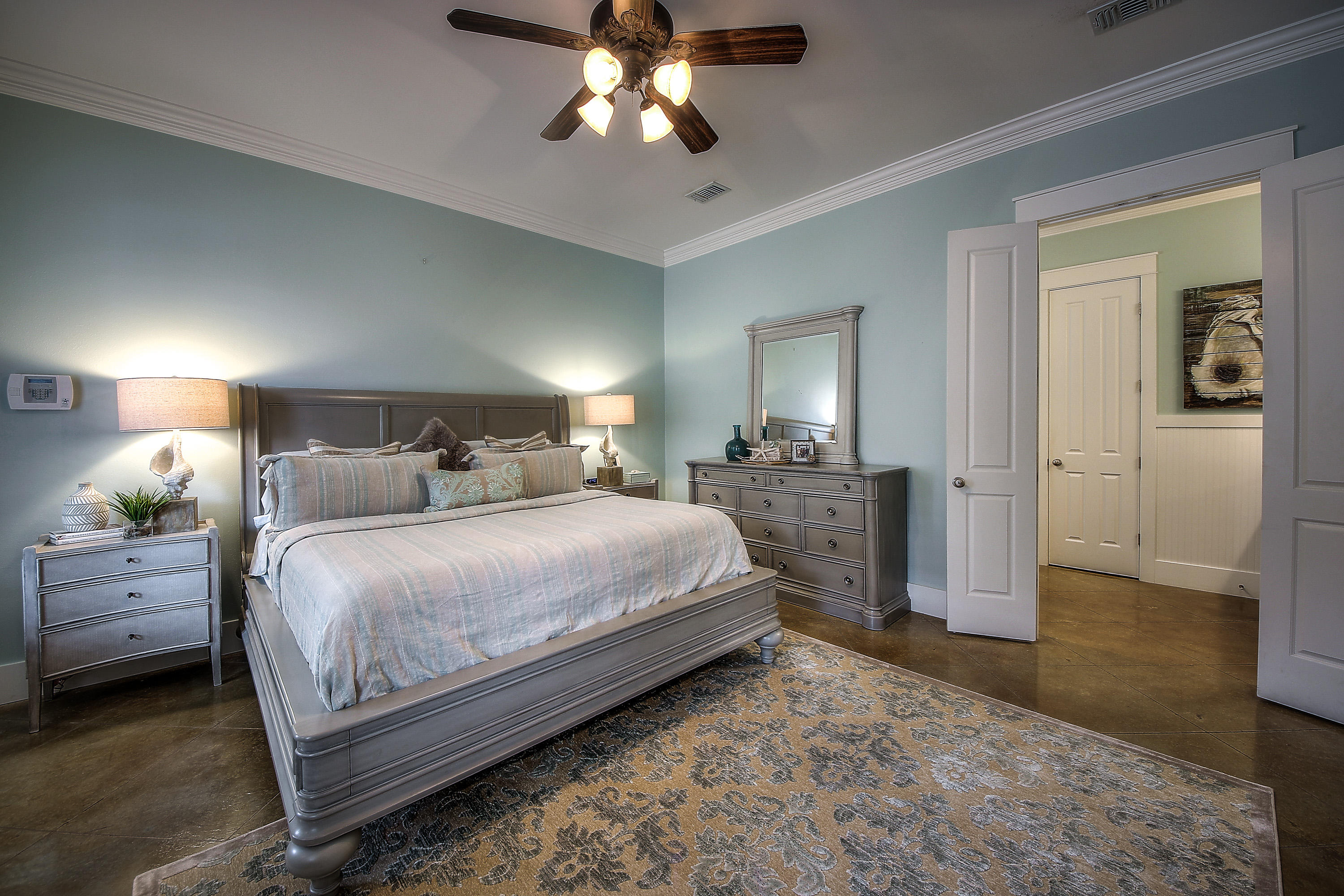 44 Brenda Lane Inlet Beach, FL 32461 - Photo 13 of 39 a bedroom with a bed and a chandelier