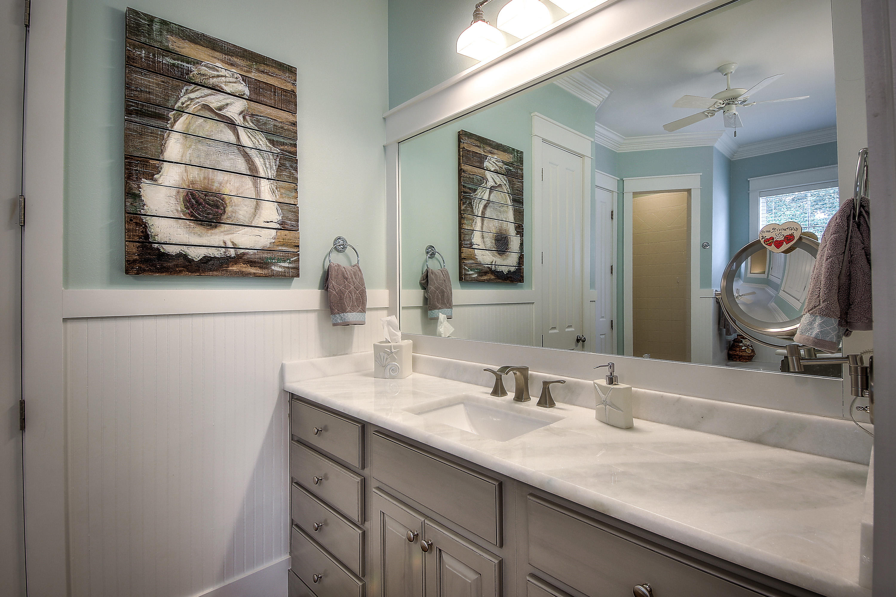 44 Brenda Lane Inlet Beach, FL 32461 - Photo 16 of 39 a bathroom with a sink and a mirror