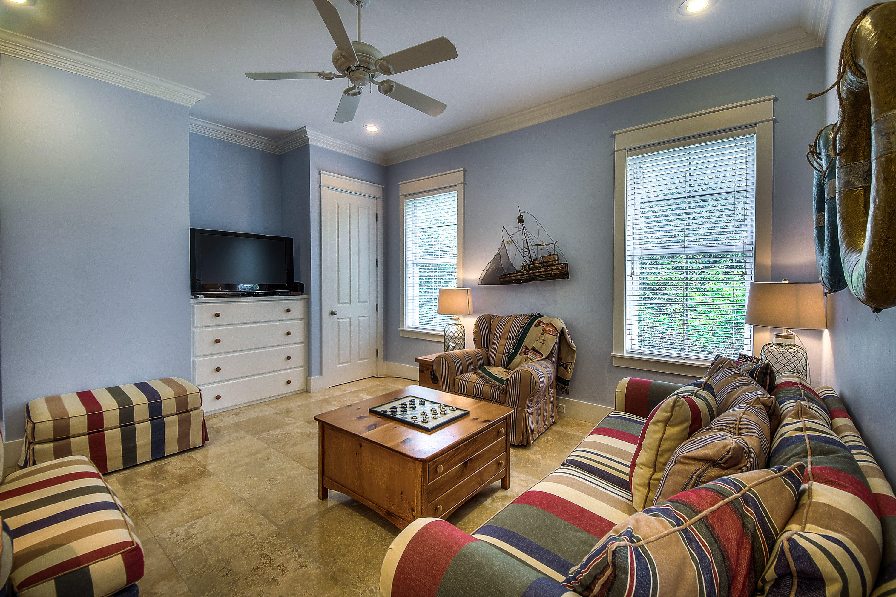 44 Brenda Lane Inlet Beach, FL 32461 - Photo 17 of 39 a bedroom with furniture and a flat screen tv