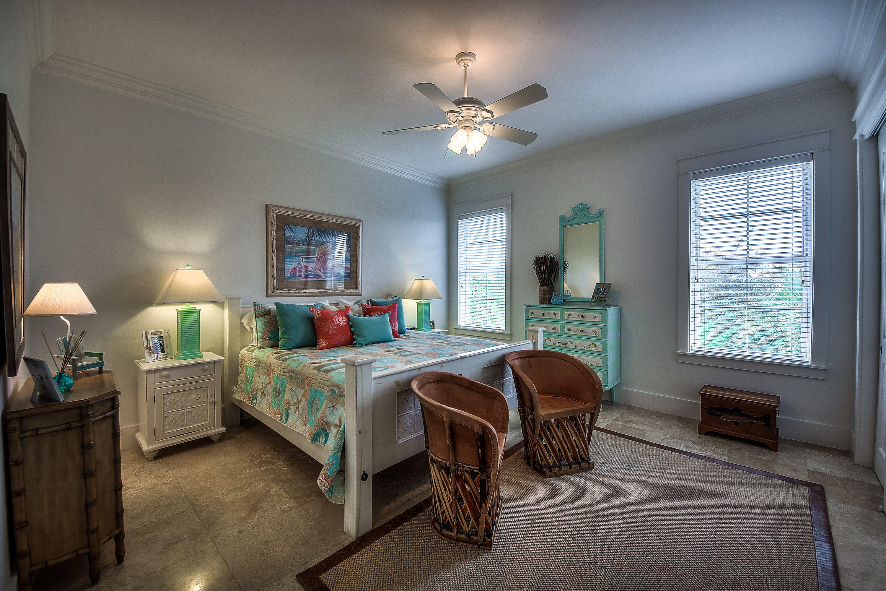 44 Brenda Lane Inlet Beach, FL 32461 - Photo 21 of 39 a bedroom with a bed and a chandelier
