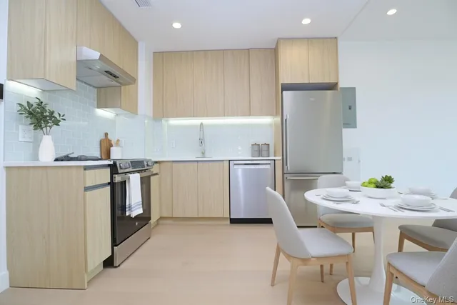 a bedroom with a bed and a lamp with window