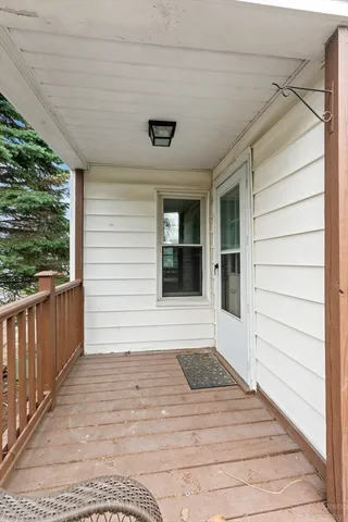 a view of house with wooden floor and outdoor space