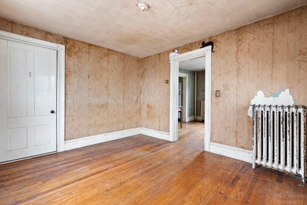 20 Harlow Street Saugus, MA 01906 - Photo 14 of 31 a view of a hallway with wooden floor