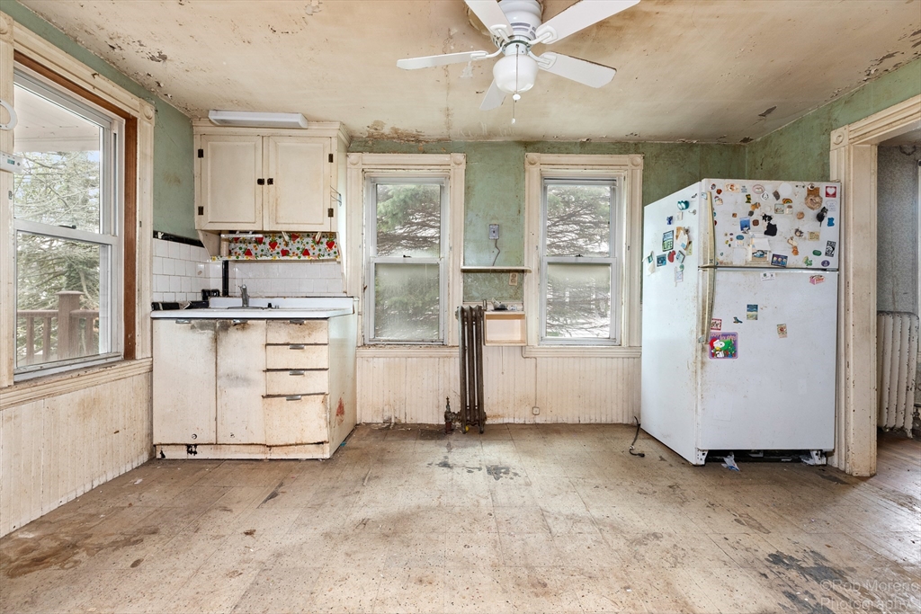 20 Harlow Street Saugus, MA 01906 - Photo 20 of 31 a view of kitchen with refrigerator and cabinets