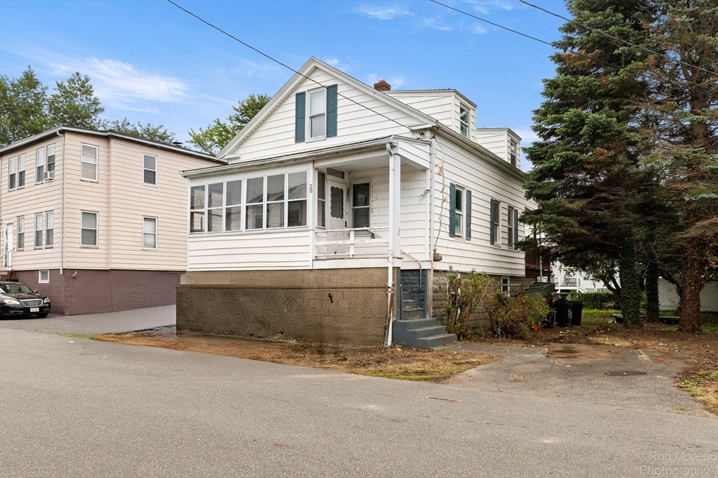 20 Harlow Street Saugus, MA 01906 - Photo 2 of 31 a front view of a house with a yard