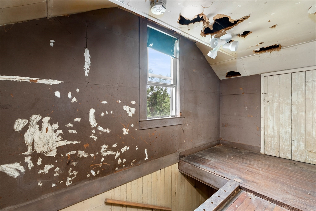 20 Harlow Street Saugus, MA 01906 - Photo 25 of 31 a kitchen with a sink chandelier and living room view