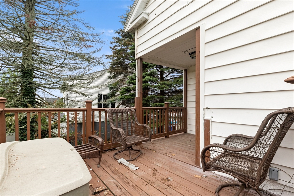 20 Harlow Street Saugus, MA 01906 - Photo 9 of 31 a balcony with table and chairs