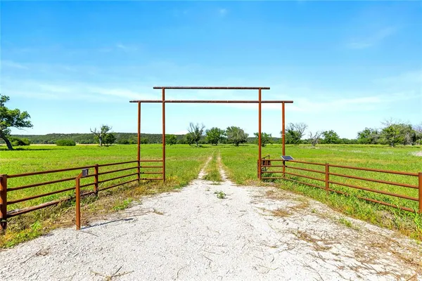 a view of a lake with a big yard