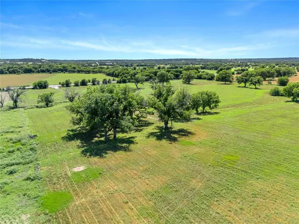a view of a lake with a city