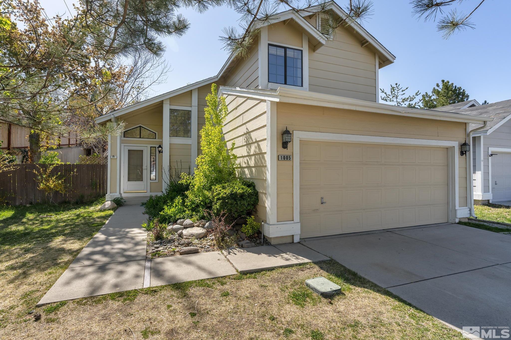 1005 Backer Way Reno, NV 89523 - Photo 1 of 20 a view of a house with a yard