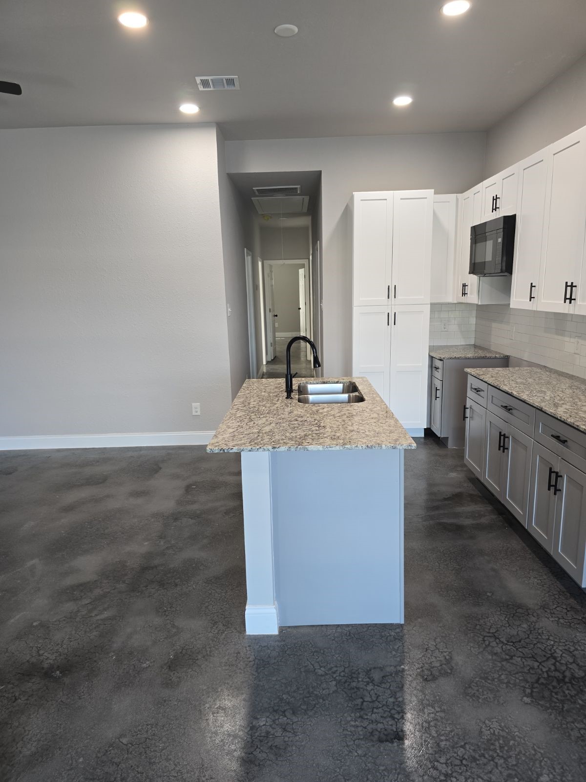 13314 HP Johnson Street, Unit B Kendleton, TX 77451 - Photo 4 of 13 Kitchen and grand hallway view