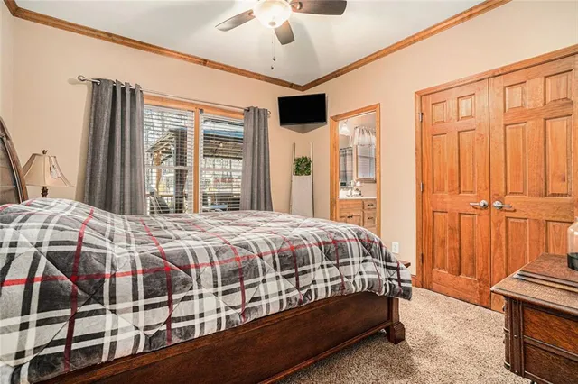 a spacious bathroom with a granite countertop sink mirror and shower
