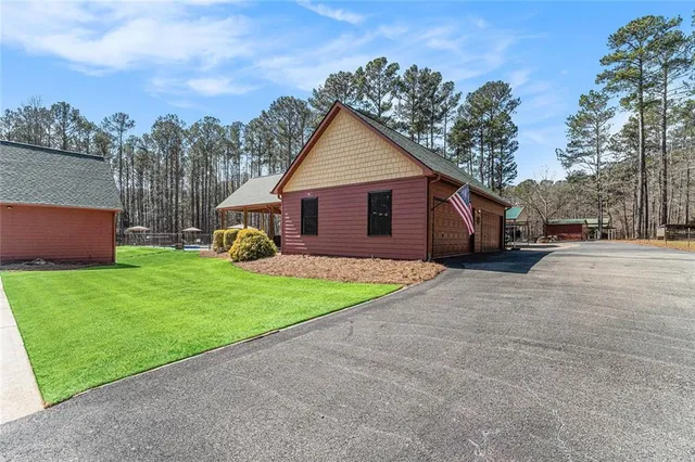 a view of an empty room with windows